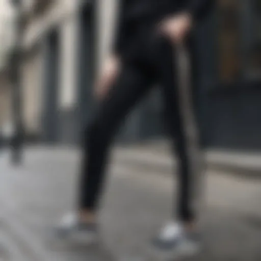 Stylish black pants with side stripe in an urban setting