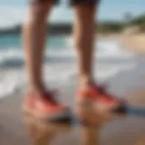 Stylish water shoes on a beach