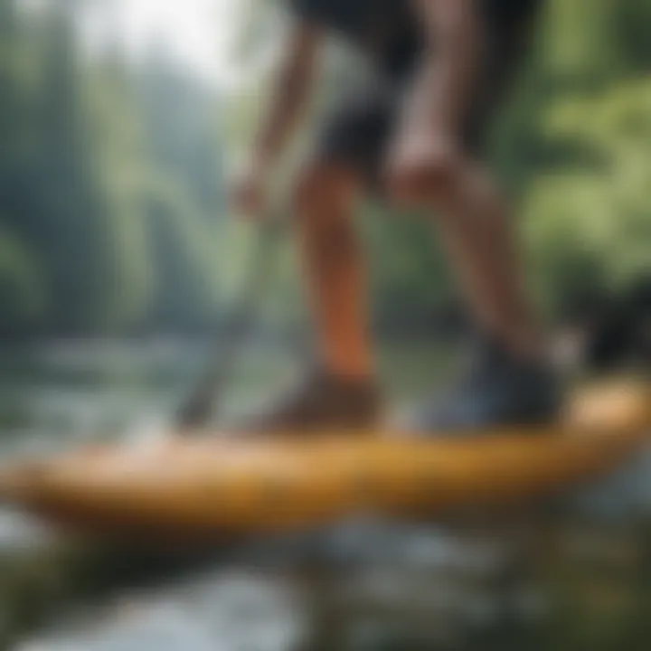 Man wearing sneaker water shoes while kayaking