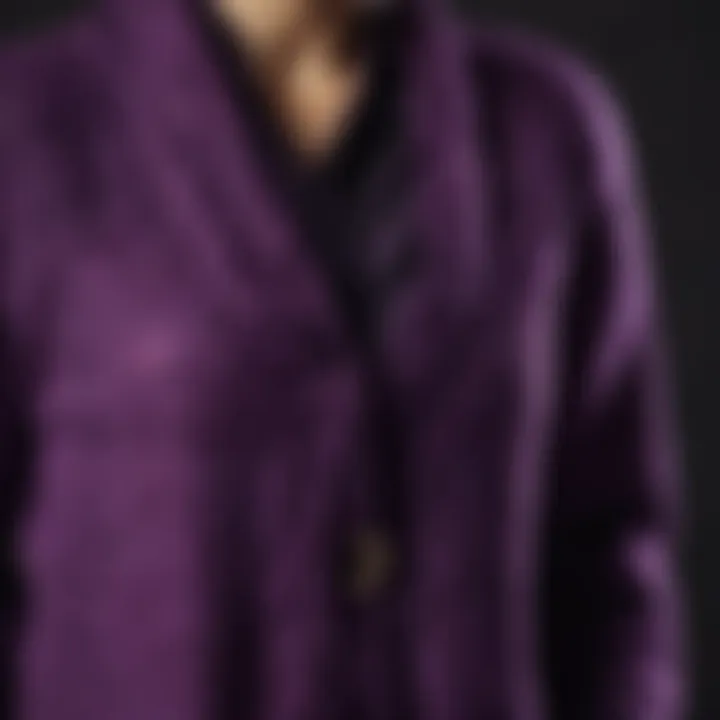 Close-up of the luxurious fabric of a long purple cardigan