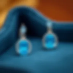 Elegant blue cubic zirconia earrings displayed on a velvet background