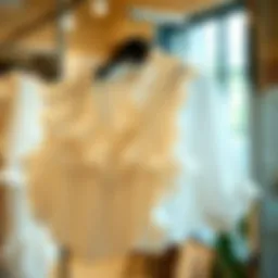 Elegant white ruffle blouse on a stylish hanger