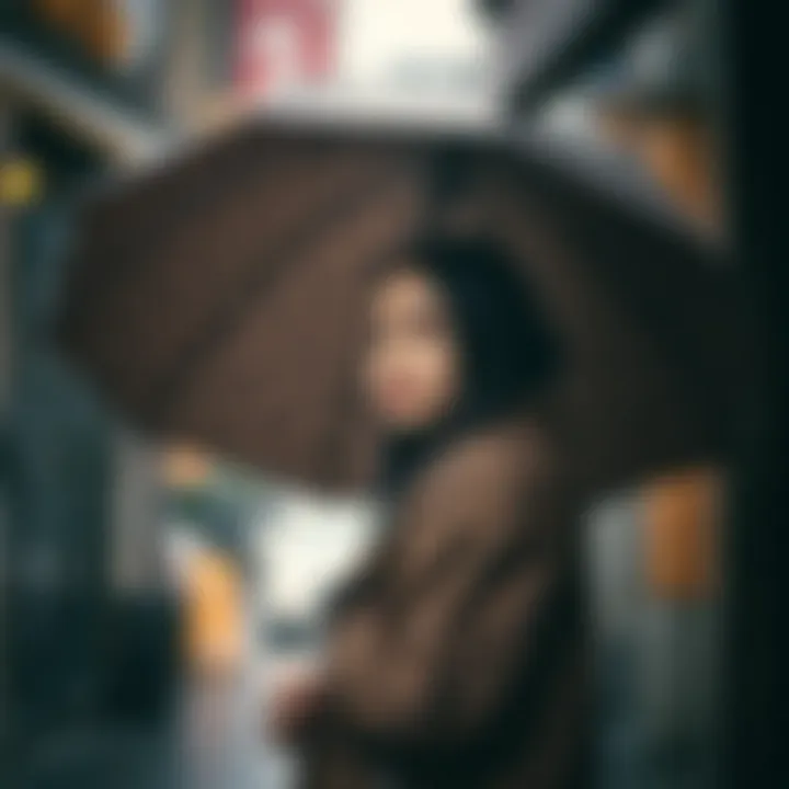 Fashionable individual holding a leopard print umbrella in the rain