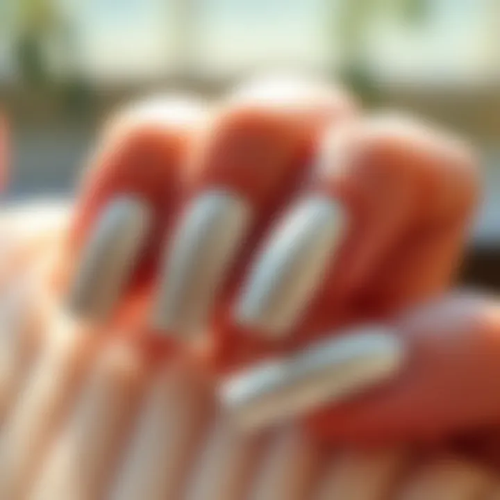 Glossy Finish of Platinum Nails Glossy platinum nails under natural light