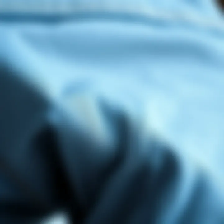 Texture Detail of Tapered Light Wash Jeans A close-up of the fabric texture of tapered light wash jeans.