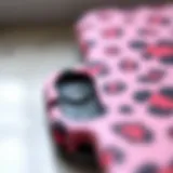 Close-up of a pink cheetah print phone case showcasing texture and design