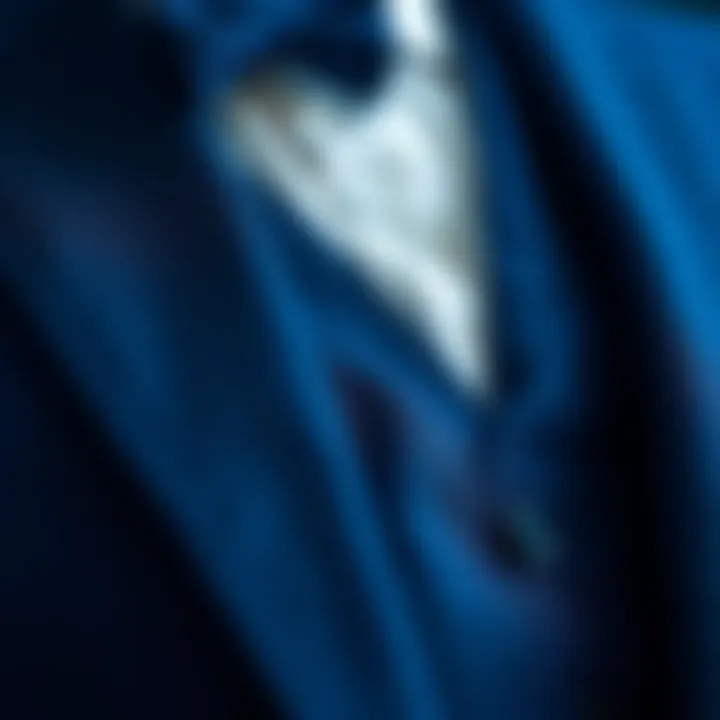 Close-up of fabric texture of a blue suit paired with a vest