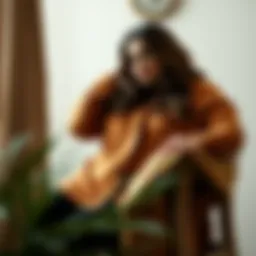 Stylish plus size camel cardigan draped elegantly over a chair