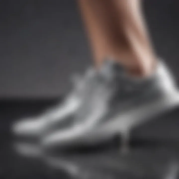 A fashionable individual wearing silver glitter sneakers paired with contemporary attire