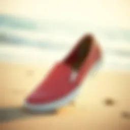 Stylish slip-on canvas shoes on a sunny beach